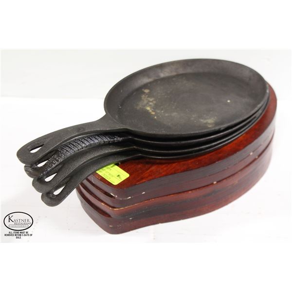 FOUR WINCO 268 CAST IRON SERVERS W/ WOOD TRIVETS