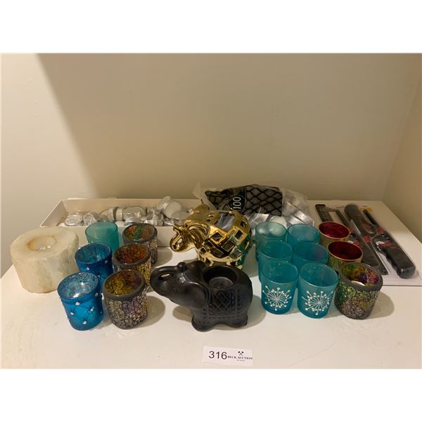 Assortment of Tea Candle Holders, Tea Candles, and Lighters