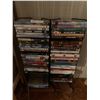 Image 1 : Metal DVD Rack w/ Assortment of DVDs