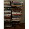 Image 3 : Metal DVD Rack w/ Assortment of DVDs