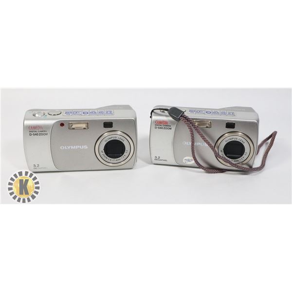 TWO OLYMPUS DIGITAL CAMERAS WITH ONE 1GB