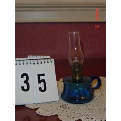 OIL LAMP - 7" TALL MINIATURE BLUE GLASS BASE WITH LOOPED HANDLE AND clear chimney