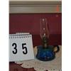 Image 1 : OIL LAMP - 7" TALL MINIATURE BLUE GLASS BASE WITH LOOPED HANDLE AND clear chimney