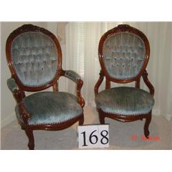 VICTORIAN WALNUT GENTLEMAN'S CHAIR W/ TUFTED BACK & BLUE VELVET SEAT, PADDED ARMS, ROSE CARVINGS AND