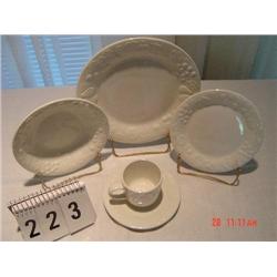 8 PLACE SETTINGS OF WHITE CHINA - RAISED FRUIT PATTERN - DINNER PLATES, BOWLS, SALAD PLATES, CUPS/SA