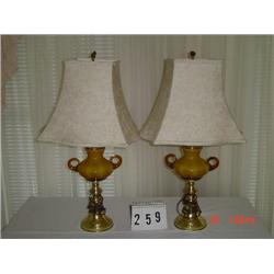 PAIR OF SOLID AMBER COLOR 2-HANDLED LAMPS WITH BRASS TONE BASES AND BEIGE DAMASK CLOTH SHADES