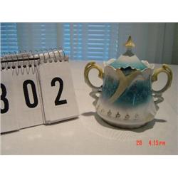 UNMARKED TEAL, YELLOW, WHITE AND GOLD SUGAR JAR WITH LID (MINOR CHIPS)