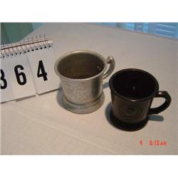 (1) BLACK PORCELAIN MUG, (1) TIN MUG with flower engraving