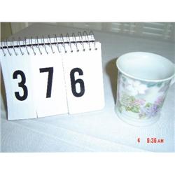 MUG marked Three Crown - has hydrangeas