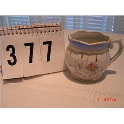 MUG marked Ford Bros. Champion - with blue rim, pink flowers