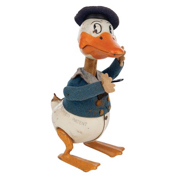 A Schuco Donald Duck Wind-Up Toy.