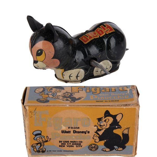 A Figaro Wind-Up Tin Toy with box.