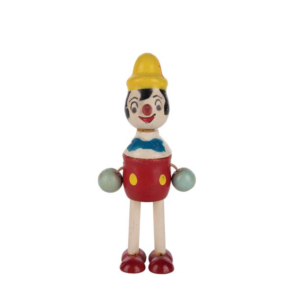 A Pinocchio Wooden Figure.
