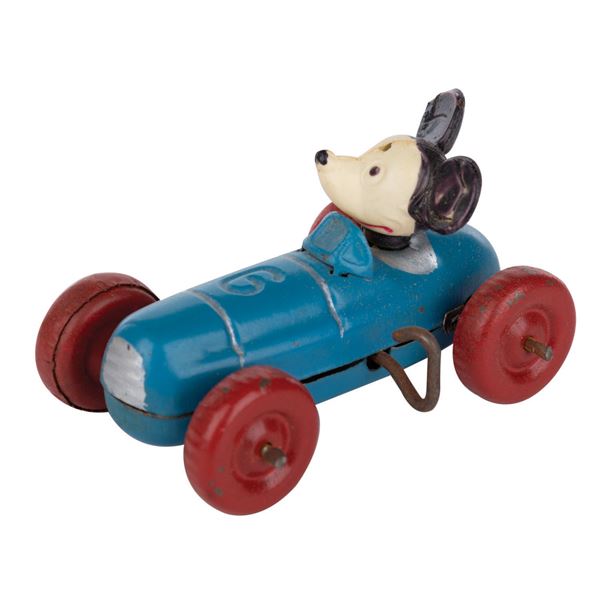 A Mickey Race Car Tin Toy.