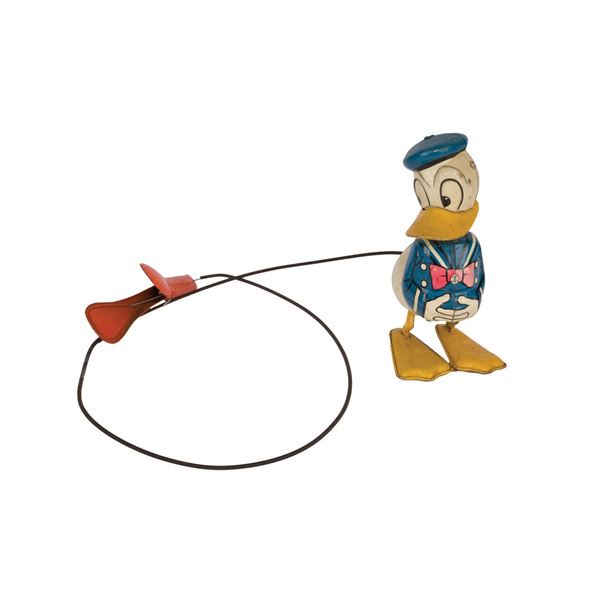 A Donald Duck Hopping Tin Toy.