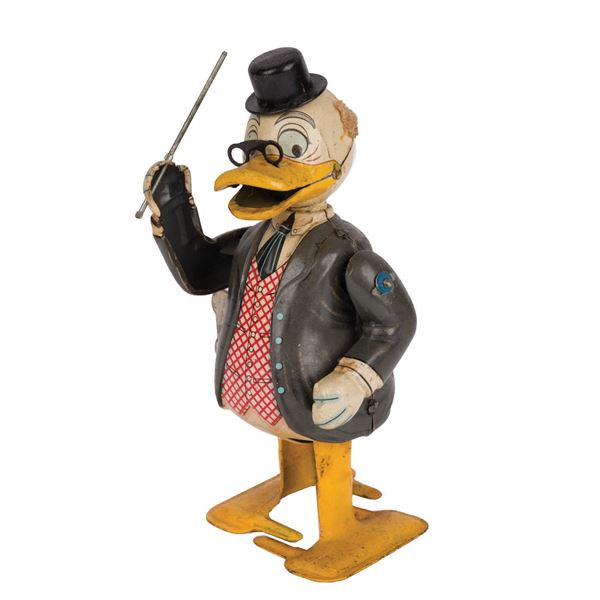 A Ludwig Von Drake Wind-Up Tin Toy.