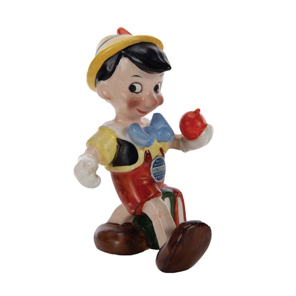 A Goebel Pinocchio Ceramic Figurine.
