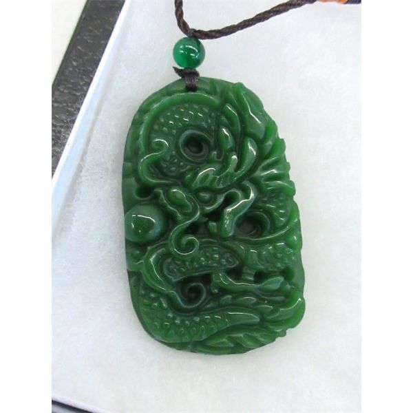 Carved Jade Dragon Pendant on Cord