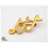 Image 1 : MEDIUM GOLD TONE W/ WHITE RHINESTONE MUSICAL