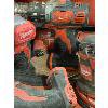 Image 2 : MILWAUKEE TOOL KIT - DRILLS, CUT OFF SAW, LIGHTS - NO BATTERIES