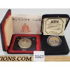 Image 1 : LOT OF 2 - 2002 COLOURIZED LOONIE AND 1971 BC SILVER DOLLAR