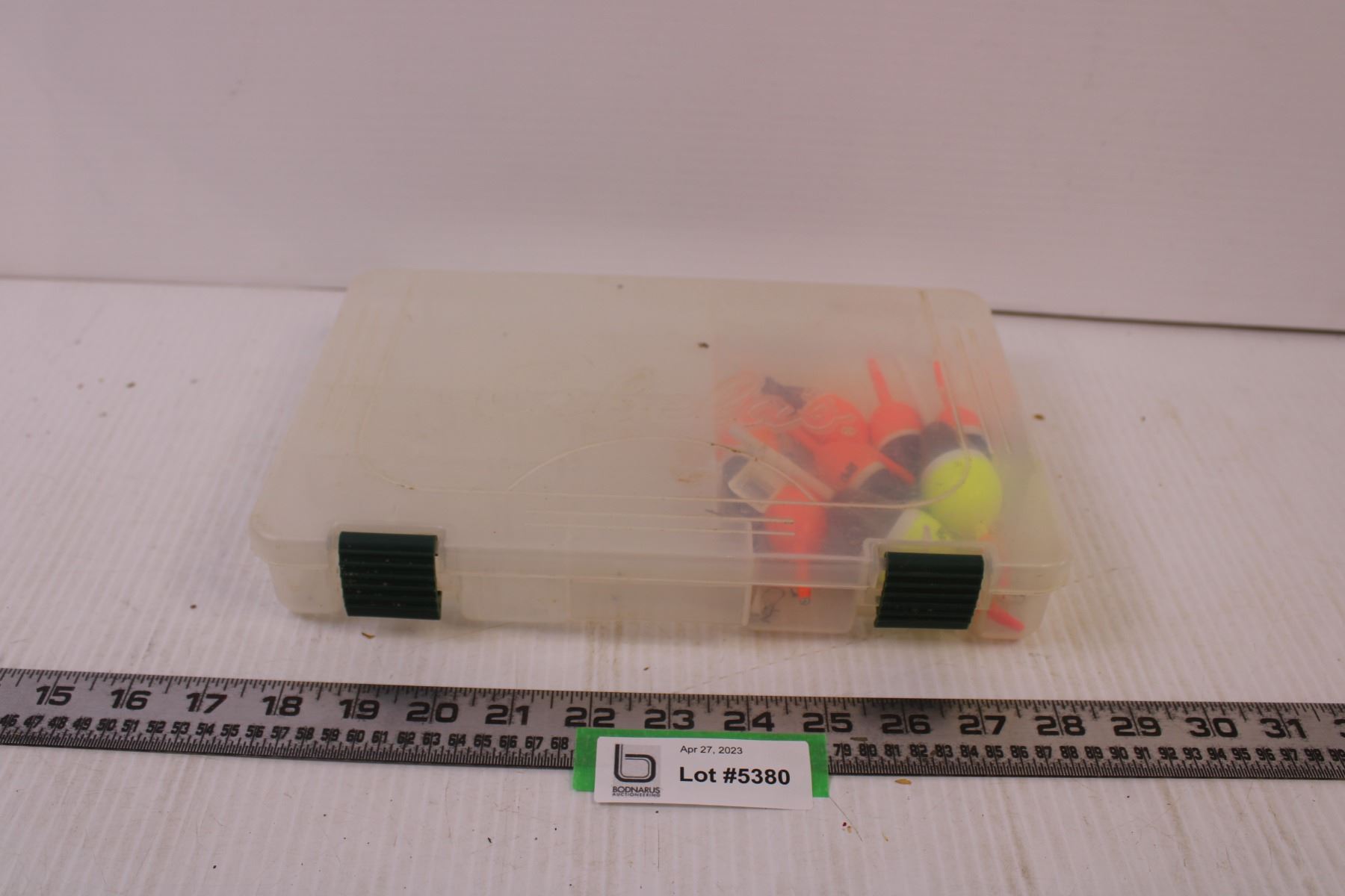 Cabela's Color Box Cabela's tackle box with assorted floats - Bodnarus Auctioneering