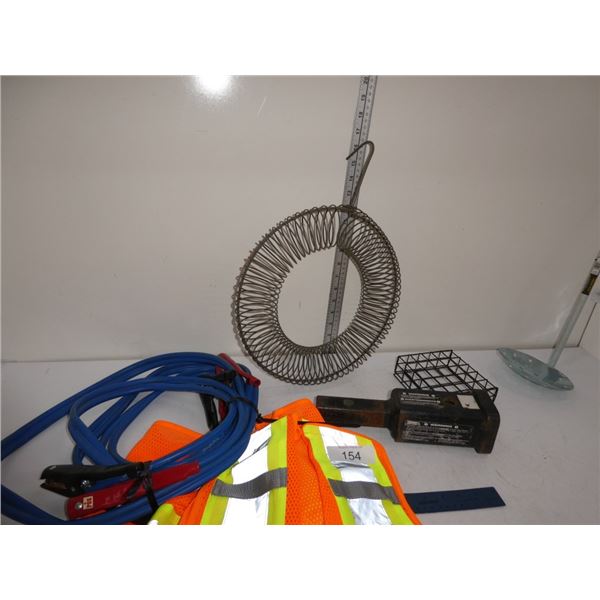 hi-vis vest, jumper cables, hitch.peanut feeder