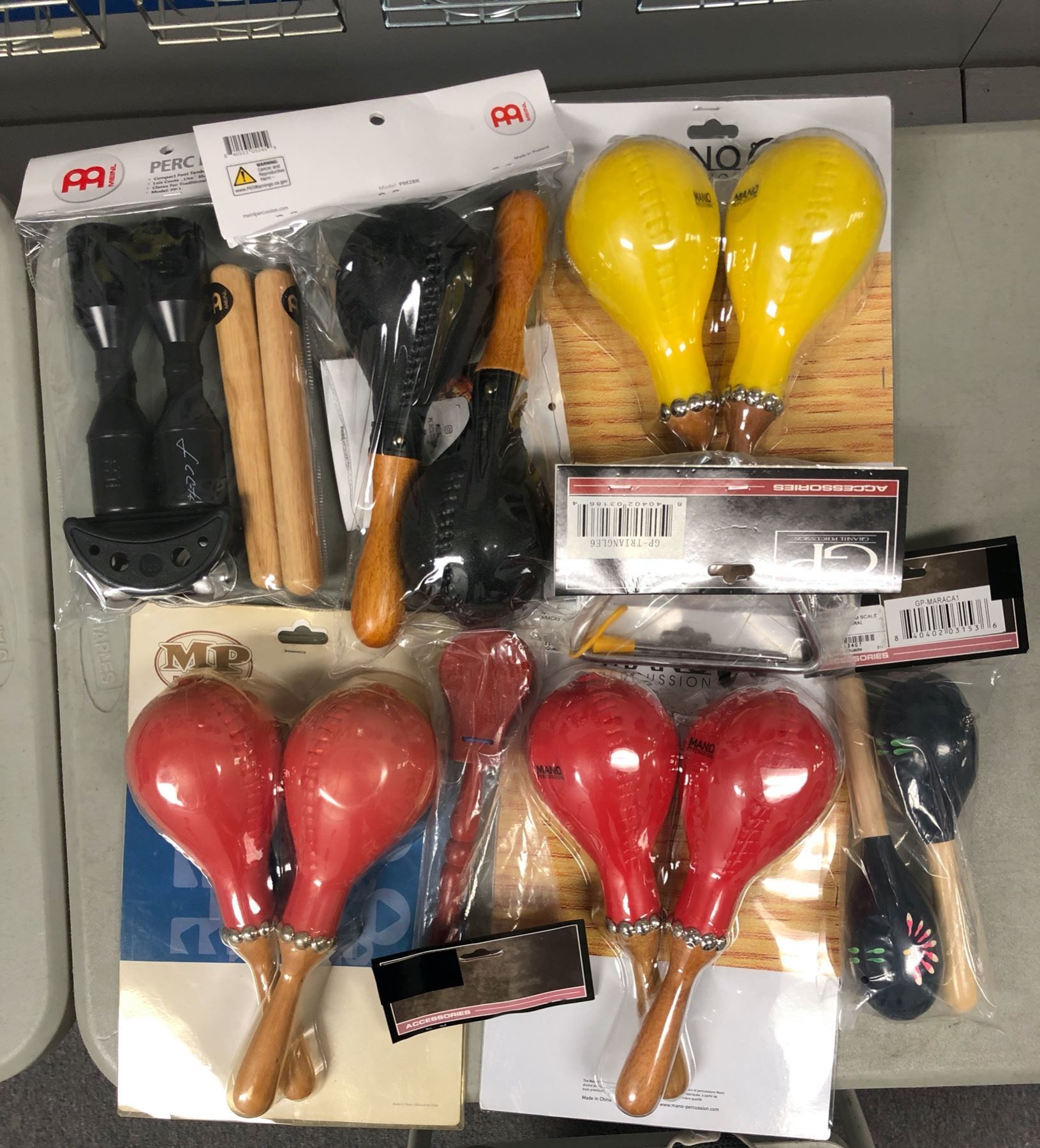 Large group of new assorted maracases/ foot tambourine/ triangle instrument