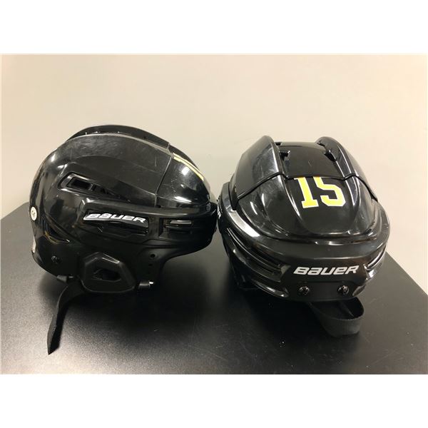 Group of 2 black Bauer adjustable hockey helmets - includes IMS 5.0 L