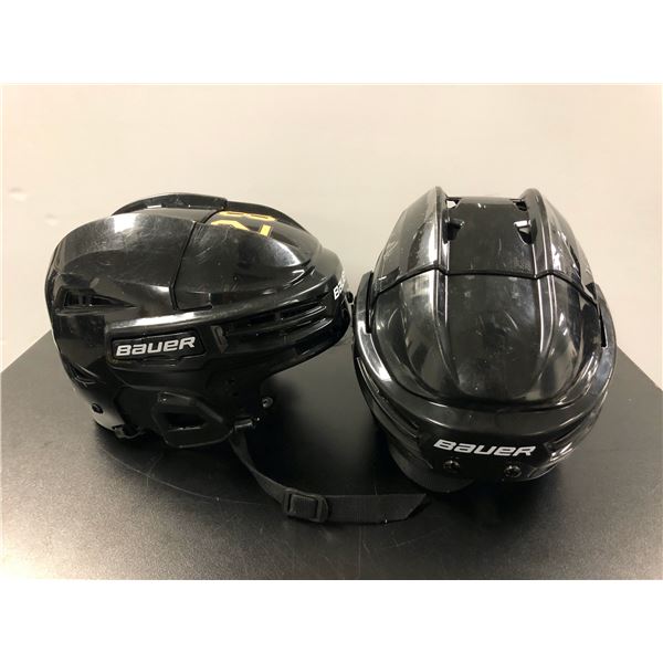 Group of 2 black Bauer adjustable hockey helmets - includes IMS 5.0 M