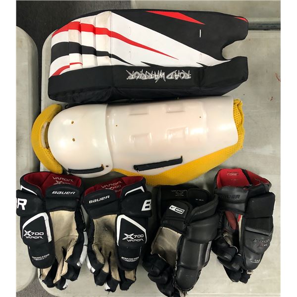 Group of assorted hockey items - includes Bauer 15  & 14  ice hockey gloves/ 1 shin pad/ 1 Road Warr