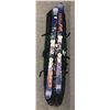 Image 2 : Pair of Volkl 61" skis w/ Ultra alloy 6063-T8 42" sticks & bag