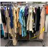 Image 2 : 2 racks full of assorted set dec wardrobe - includes ladies dresses/ men's shirts/ sleeveless tops e