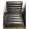 Image 1 : Black leather contemporary armchair