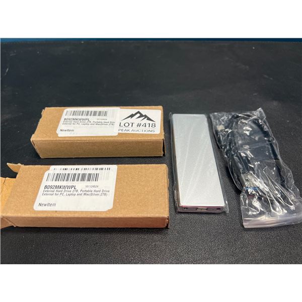 Lot of 2 Portable External Hard Drives - 2TB each - Silver