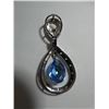 Image 2 : Large pear shaped blue topaz hanging from solid