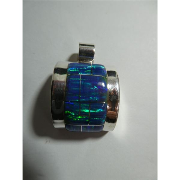 Inlay blue opal concave pendant.