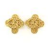 Image 1 : Chanel Gold-tone Metal CC Arabesque Logo Cross Shape Clip-on Earrings