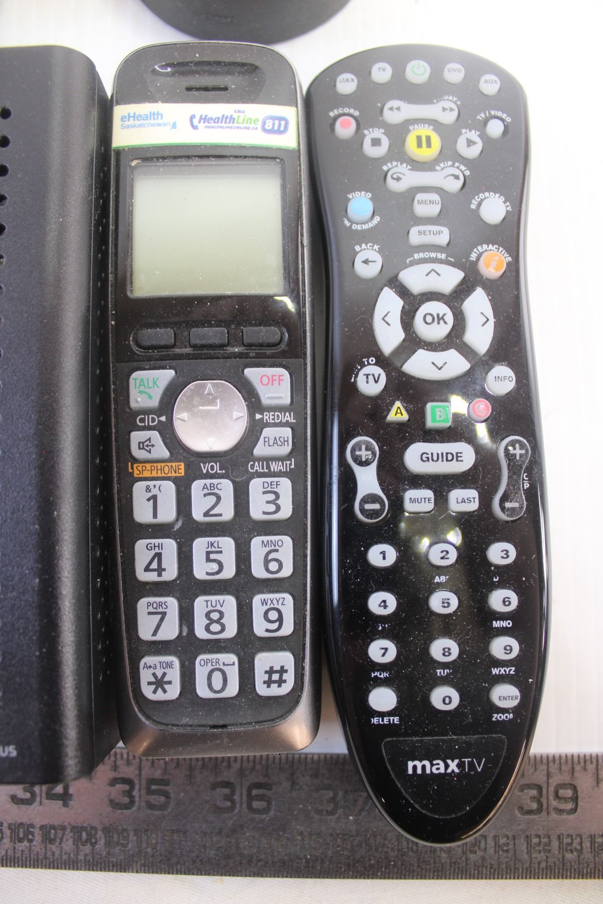 Arris cable box with remote and cordless phone and power cables and ...