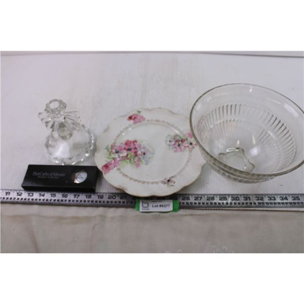 candle holder and watch and bowl and plate