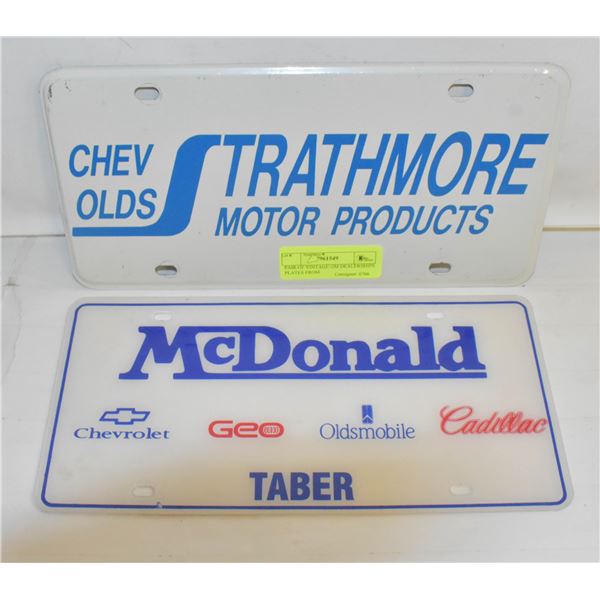 PAIR OF VINTAGE GM DEALERSHIPS PLATES FROM