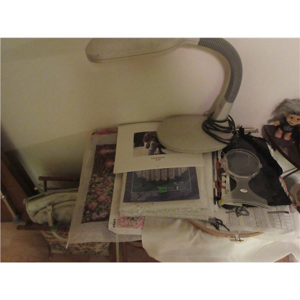 DEN:  KNITTING BASKET, WOOL, CROSS STITCH SUPPLIES, MAGNIFYING GLASS, LAMP, ETC