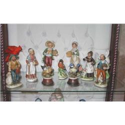 11 Porcelain figurines & 1 Fitz & Floyd swan candle warmer