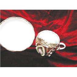 Mustache cup & saucer - Gold w/green Lily of theValley - "Castle" is written on bottom of the cup