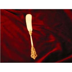 Eight silverplated spreaders in Modern Baroque