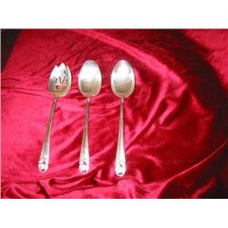 Three sterling serving pieces in "Spring Glory" by International Silver