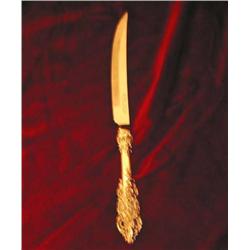 8 Silverplated steak knives in Modern Baroque by Wallace in original box