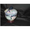 Image 1 : Chinese hand-painted porcelain jar - multicolored flowers w/gold on a wooden base from Neiman Marcus