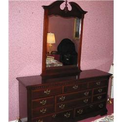 Mahogany finished dresser w/8 drawers & colonial drawer pulls & matching mirror - dresser is 63.5" l