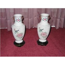 2 White pierced porcelain vases, hand painted w/gold trim, on a brown porcelain vase - vase is 10.5"